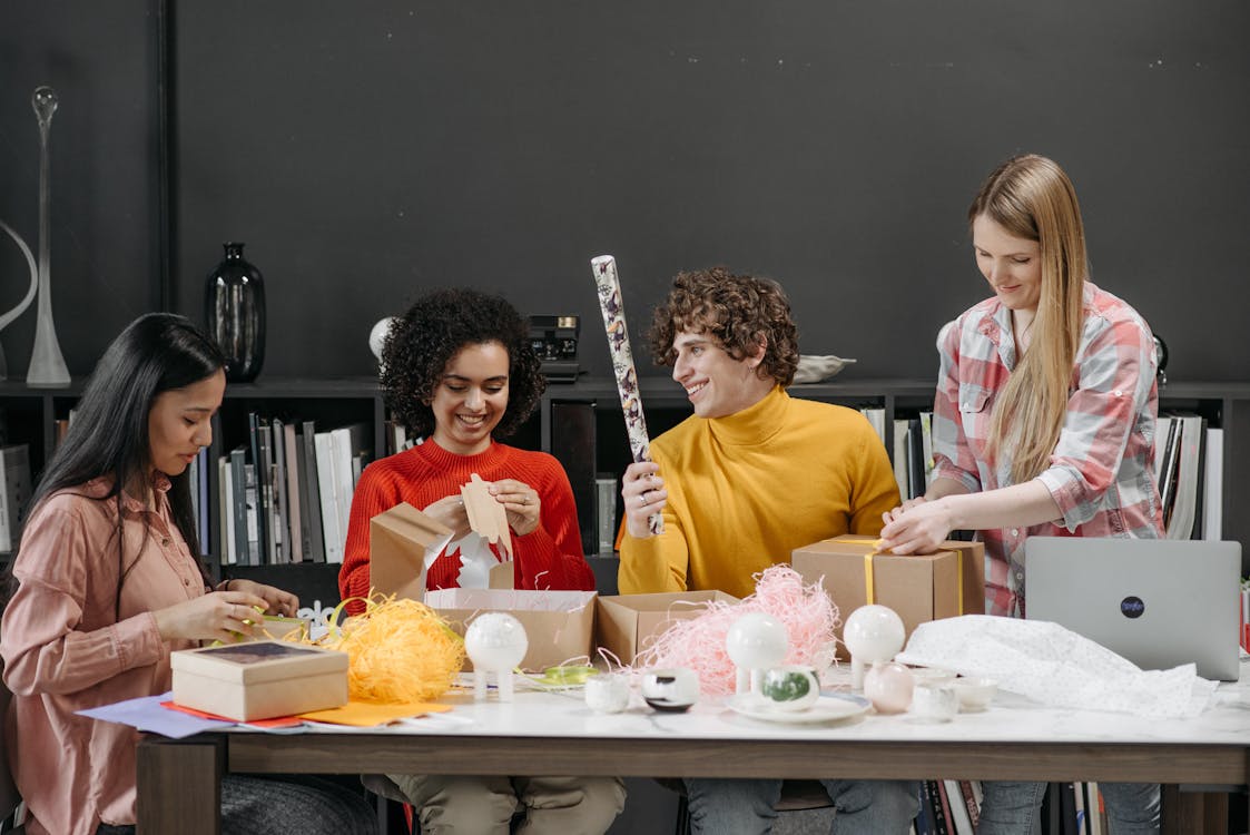  Group of People Wrapping Gift Boxes