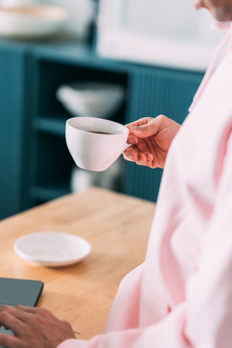 Crop Man With Cup Of Hot Coffee