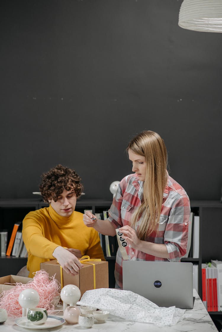 A Man And Woman Working Together 