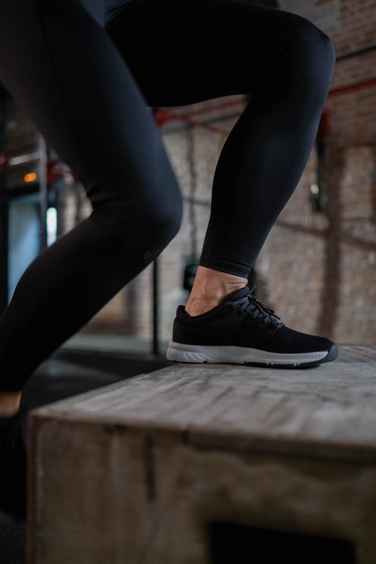 Person In Black Activewear Practicing Plyometrics