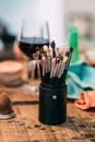 Set of makeup brushes on table