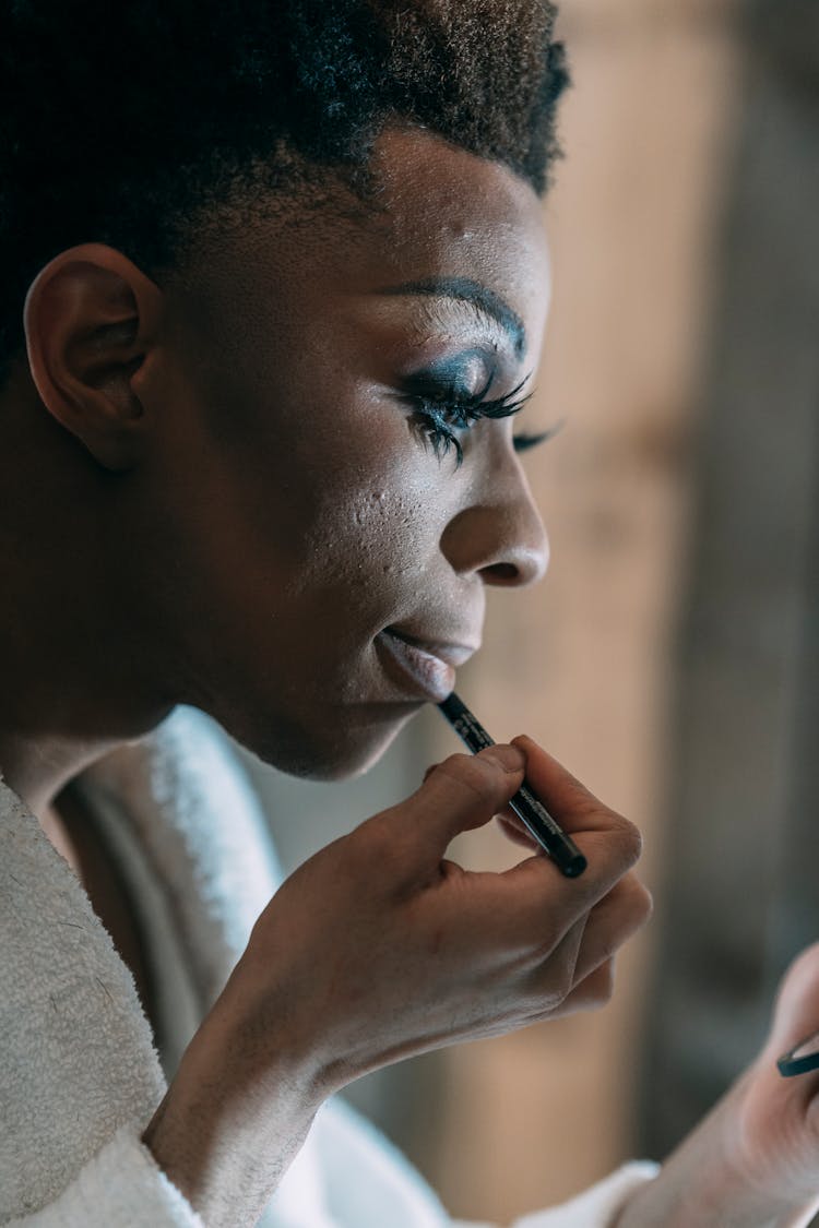 Eccentric Black Man With Lip Pencil