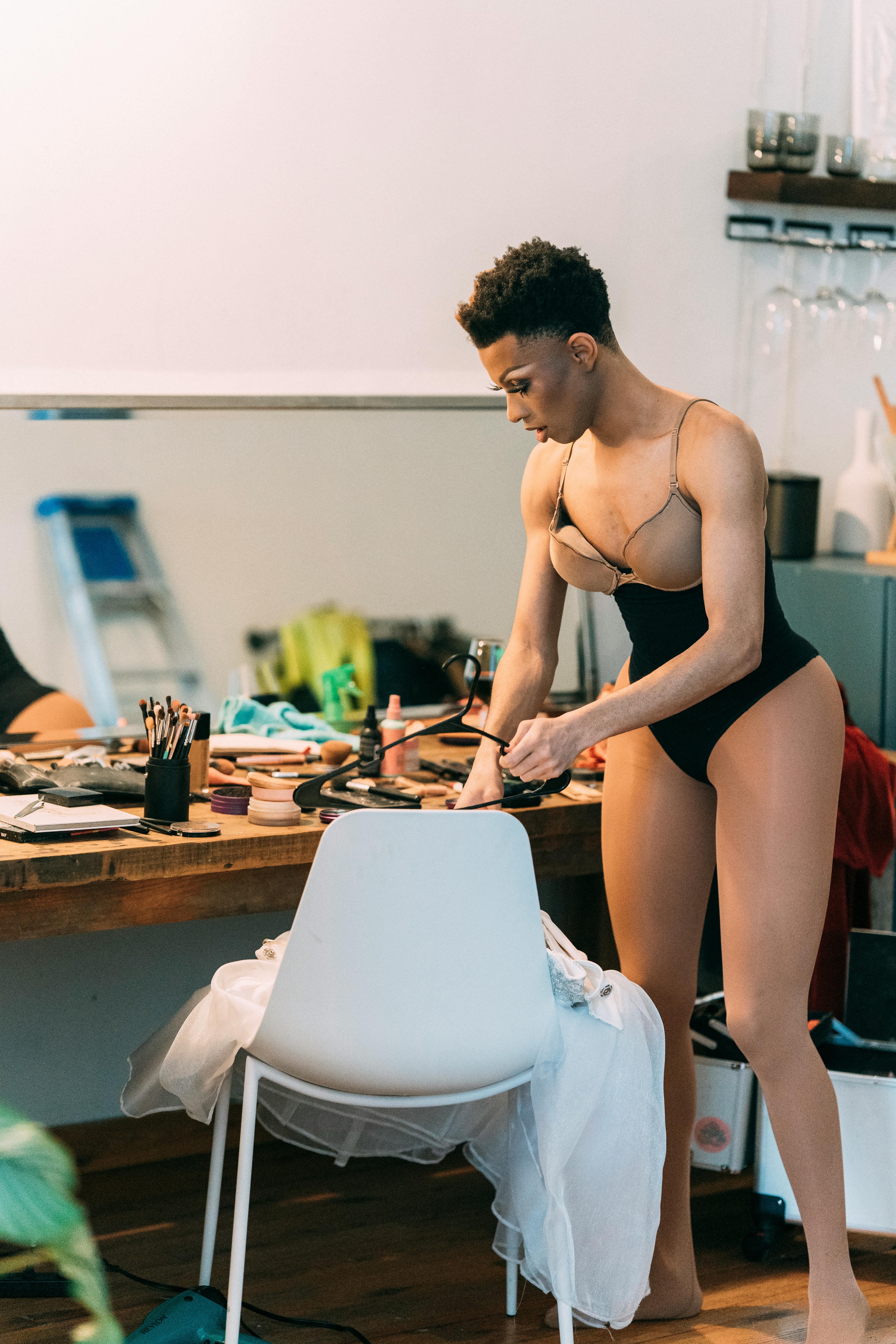 Black transvestite in underwear in dressing room · Free Stock Photo picture