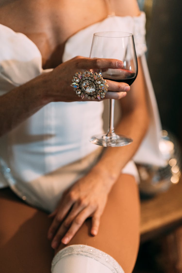 Crop Woman With Ring And Wine