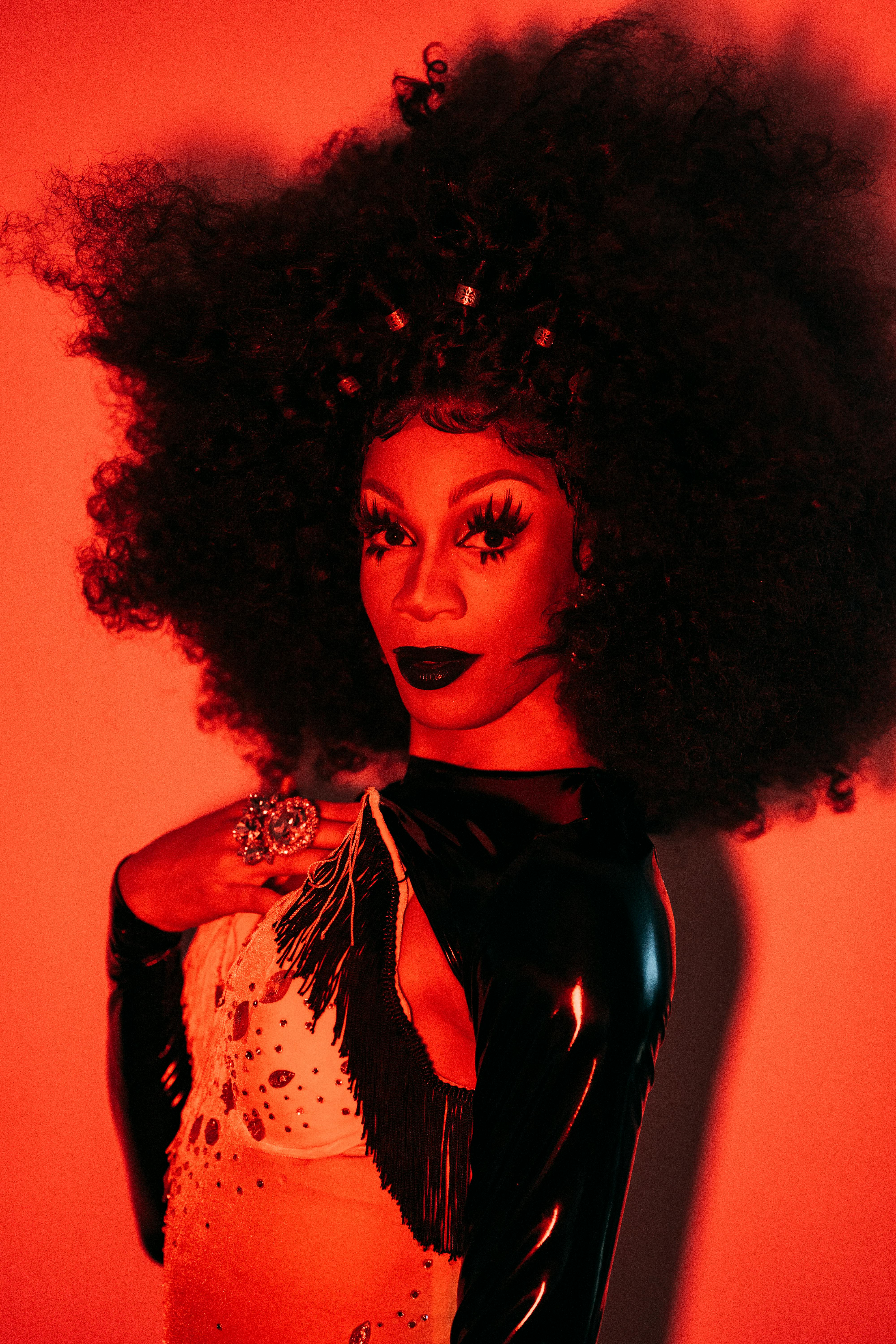 sensual drag queen in red light