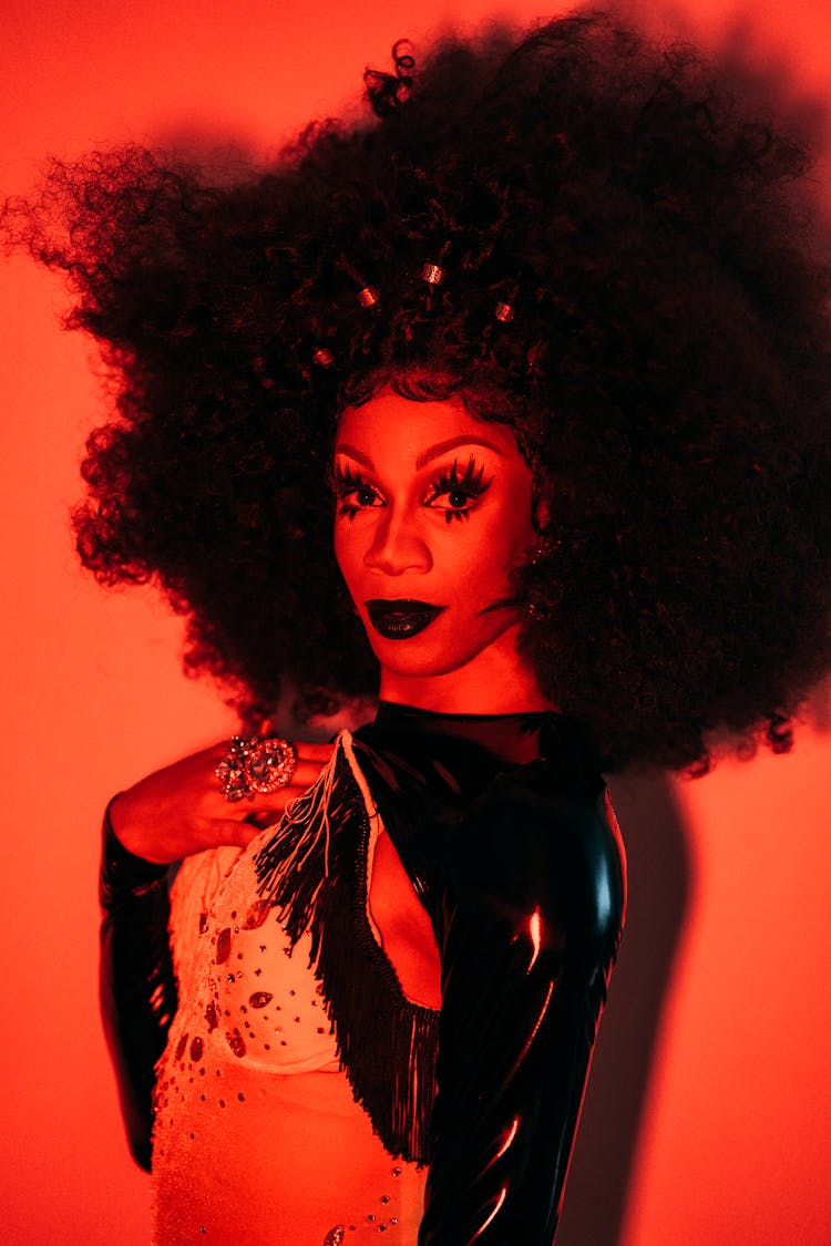 Sensual Drag Queen In Red Light