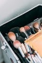 Set of makeup brushes in box