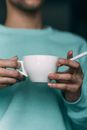 Anonymous person with cigarette and coffee