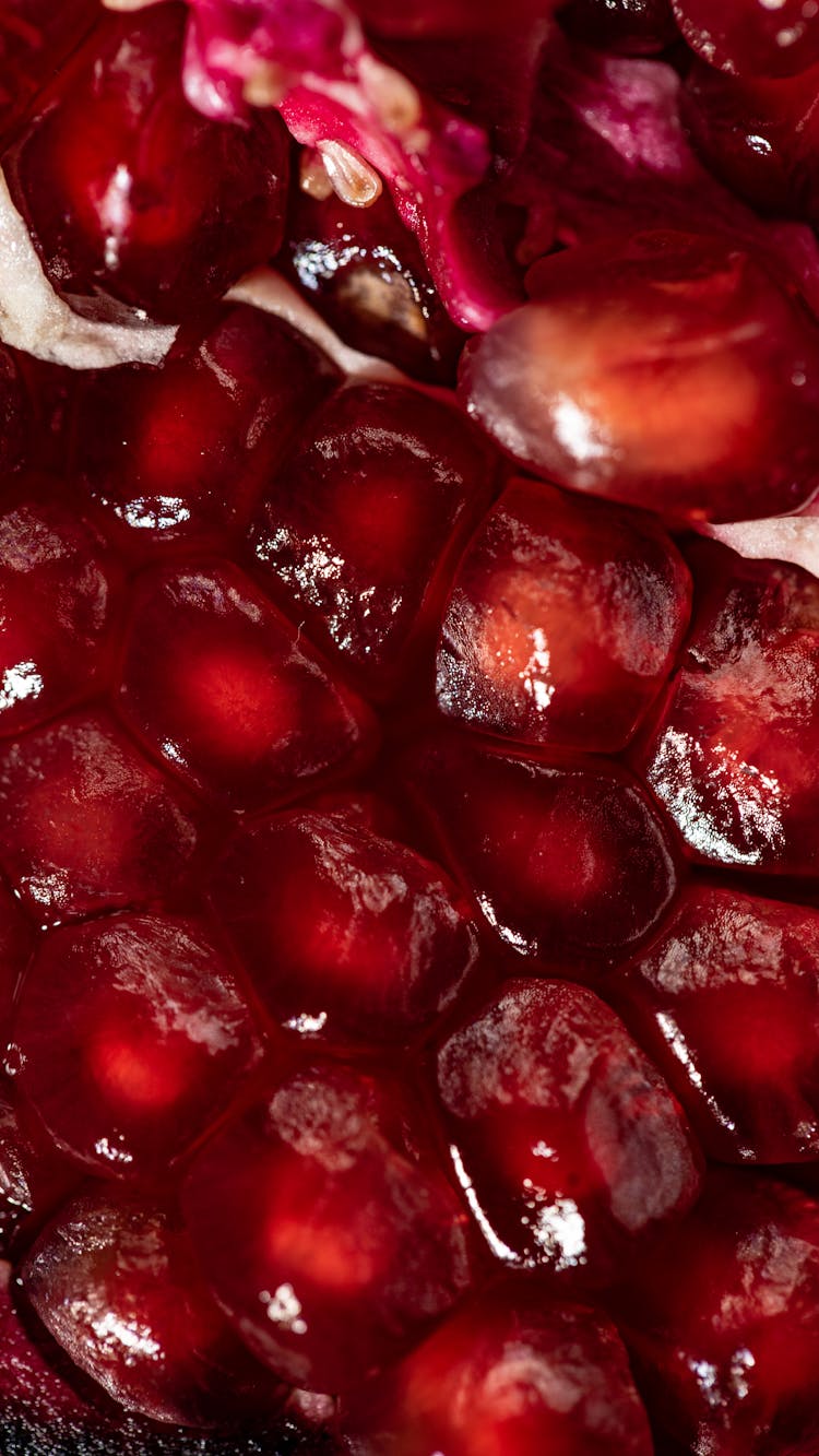 Macro Shot Of Red Pomegranate Seeds