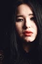 Woman With Red Lipstick and Black Mascara