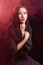 Woman in Red Hijab and White and Black Polka Dot Dress