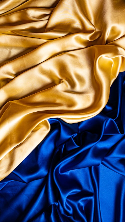 Free  A Blue and Gold Fabric in Close-up Stock Photo