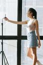 Woman in Tank Top Taking a Video of Herself