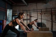 Man and Woman Practicing Plyometrics