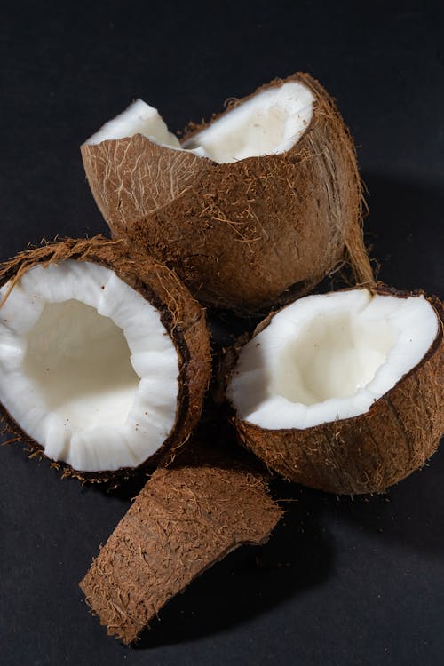 Close-Up Photo of Coconuts with White Flesh