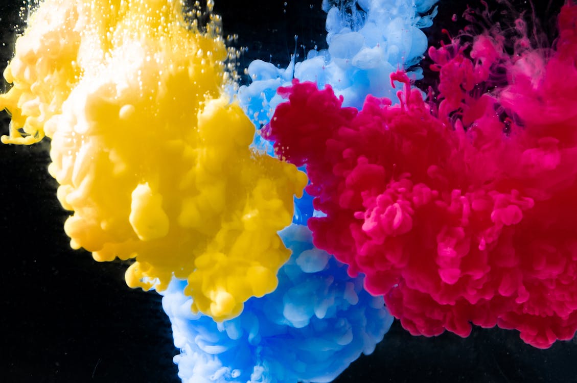 Colorful Ink Flowing Underwater · Free Stock Photo