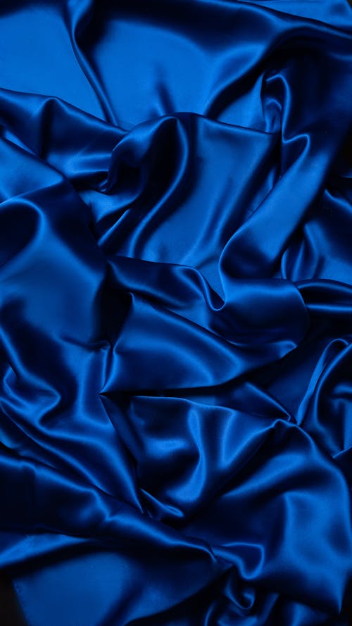 Free A Blue Silk Fabric Surface Stock Photo