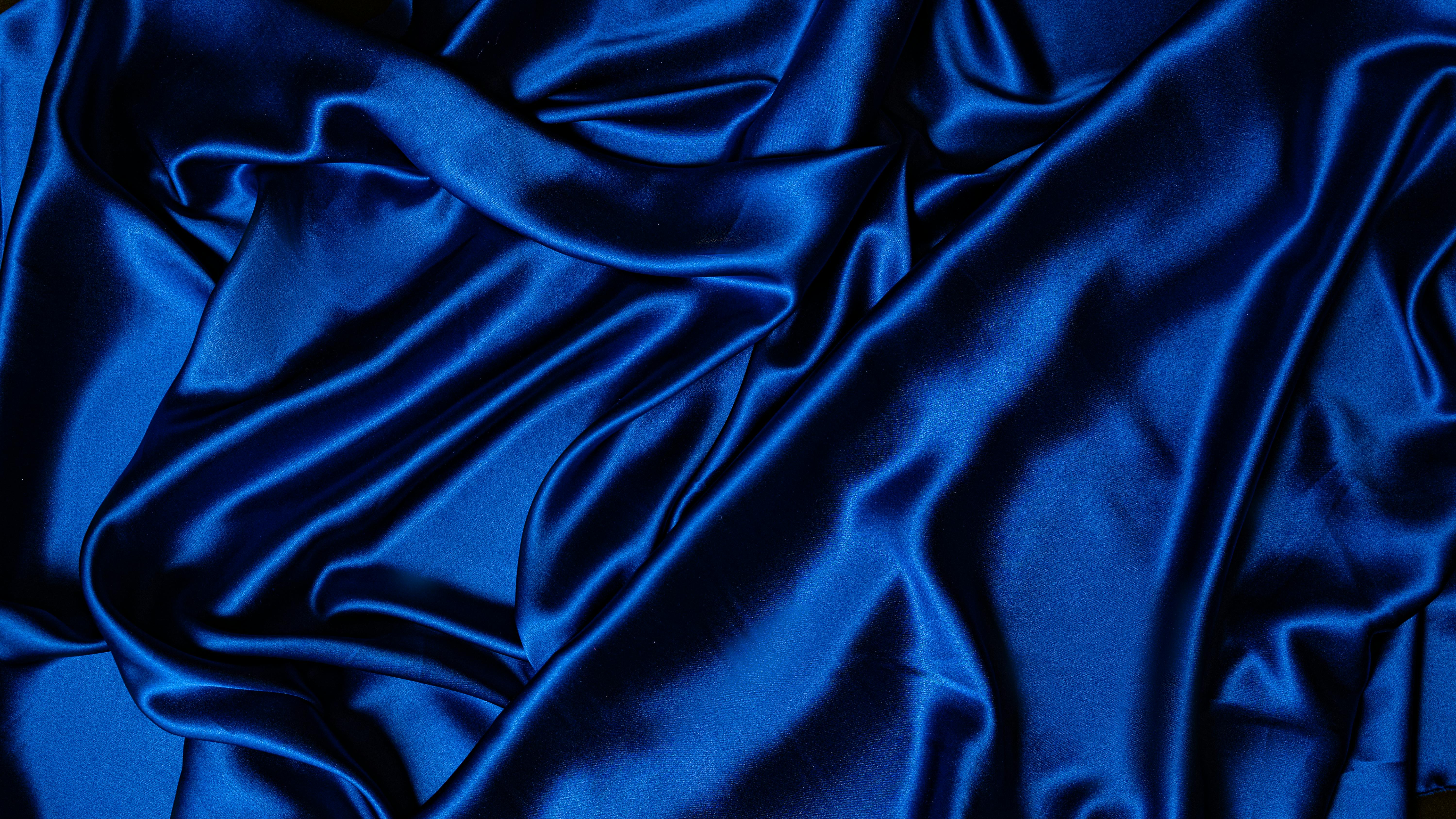 blue textile on flat surface