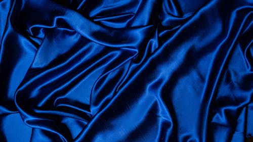Blue Textile on Flat Surface