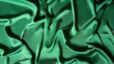 Green Textile on Flat Surface