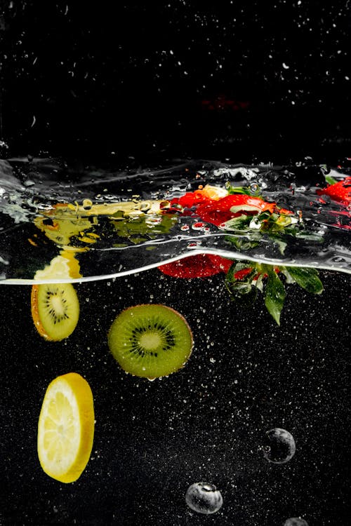 Fresh Fruits Sinking in Water