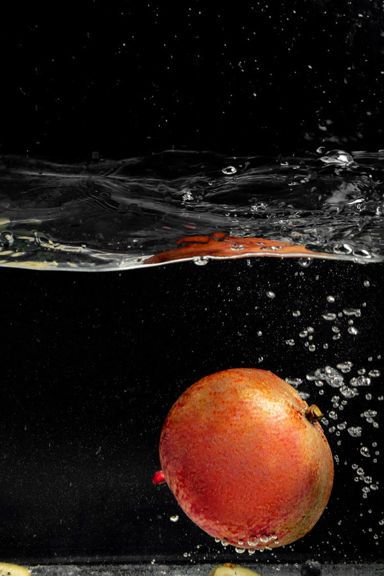 Red Apple Fruit On Water