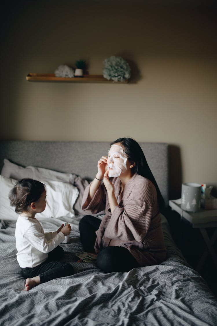 Mother Covering Her Face With Mask