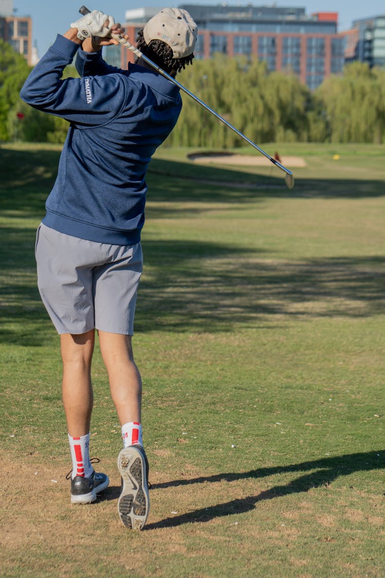 A Man Playing Golf