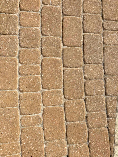 Textured pattern of paved road in city