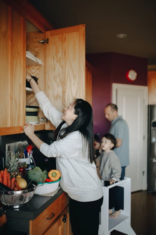 Family Preparing Food In The Kitchen