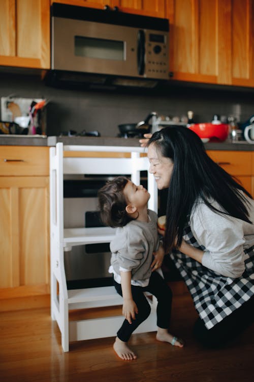 Mother And Daughter In The Kitchen