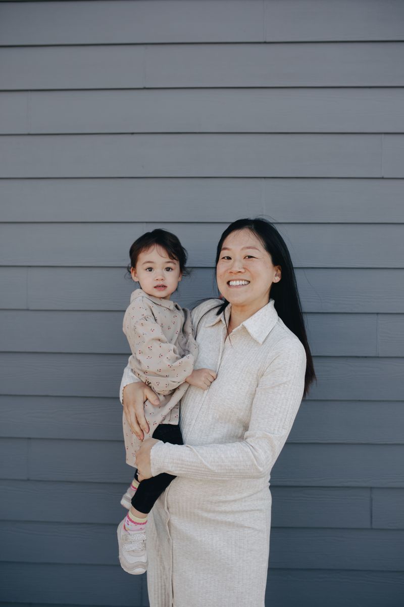 Portrait of Hannah Whitfield with her daughter