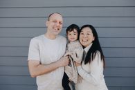 Portrait Of A Loving Couple With Their Child