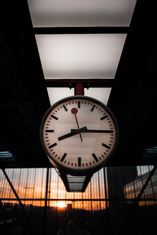 Free 
A Clock in a Train Station during the Golden Hour Stock Photo