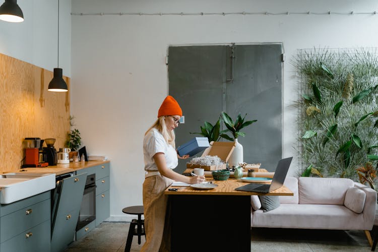 A Woman Doing Business At Home