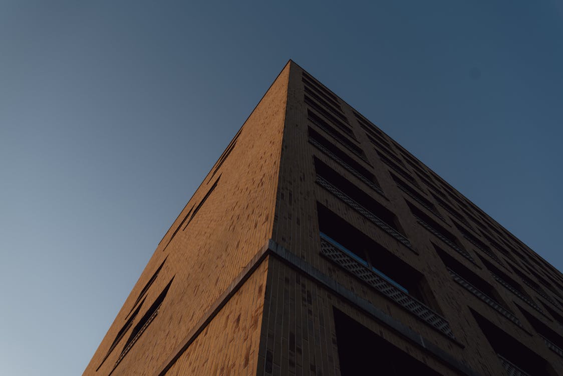 Low Angle Shot of a Brick Building