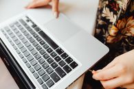 A Person Jacking Accessories in a Laptop