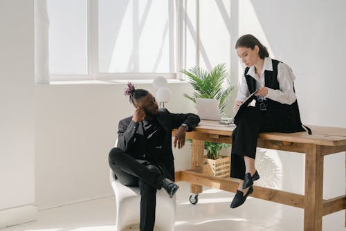 Free A Man and a Woman in a Business Talk Stock Photo