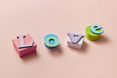 Letters on Top of Colorful Boxes 