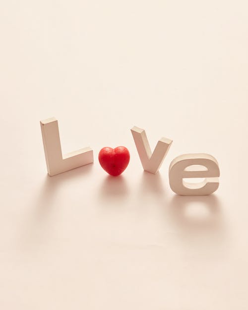 Free Word Love on White Surface Stock Photo
