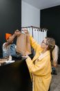 Man Handed the Shopping Bag to the Woman