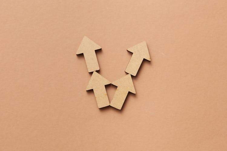 Arrows On Brown Background 