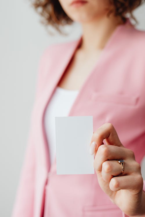 Free Woman Holding a Black Card Stock Photo