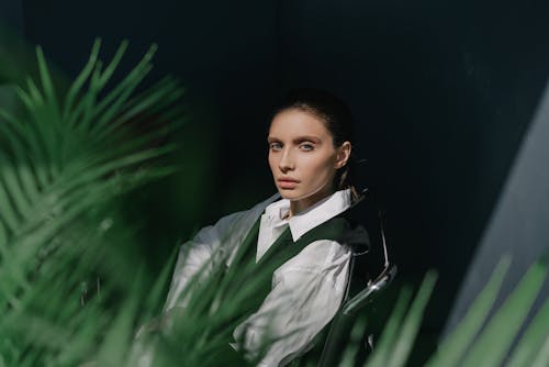 Woman Sitting on a Chair Posing