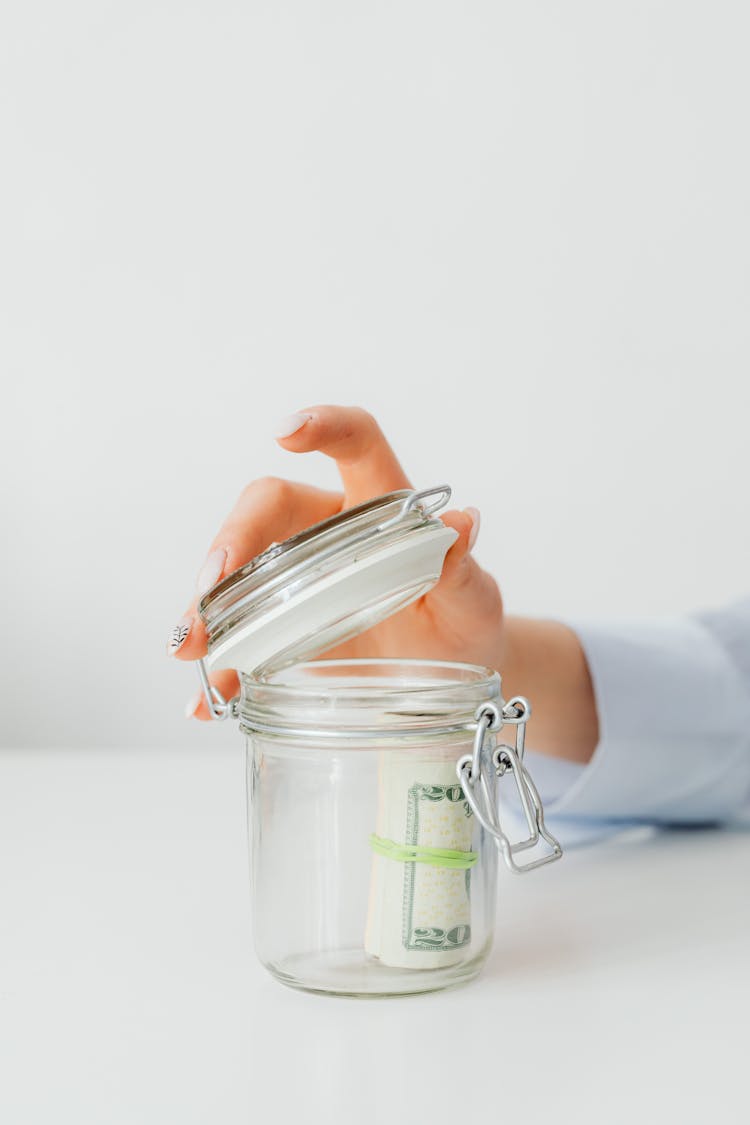 Money Inside A Glass Jar