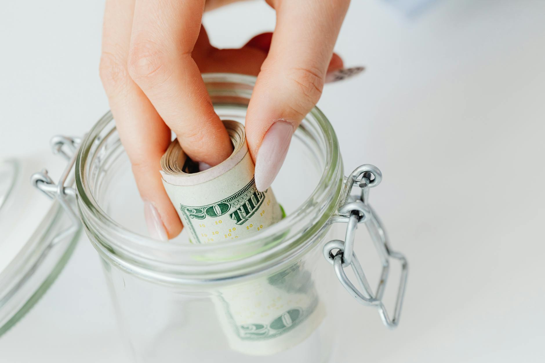 https://www.pexels.com/photo/close-up-shot-of-a-person-saving-money-in-the-glass-jar-7680483/ https://www.pexels.com/photo/close-up-shot-of-a-person-saving-money-in-the-glass-jar-7680483/