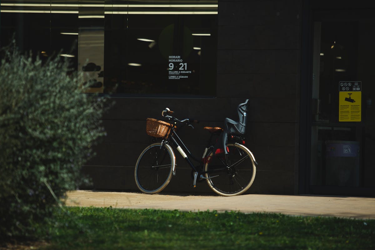 Cooked lentils in a pan being stirred with a wooden spoon