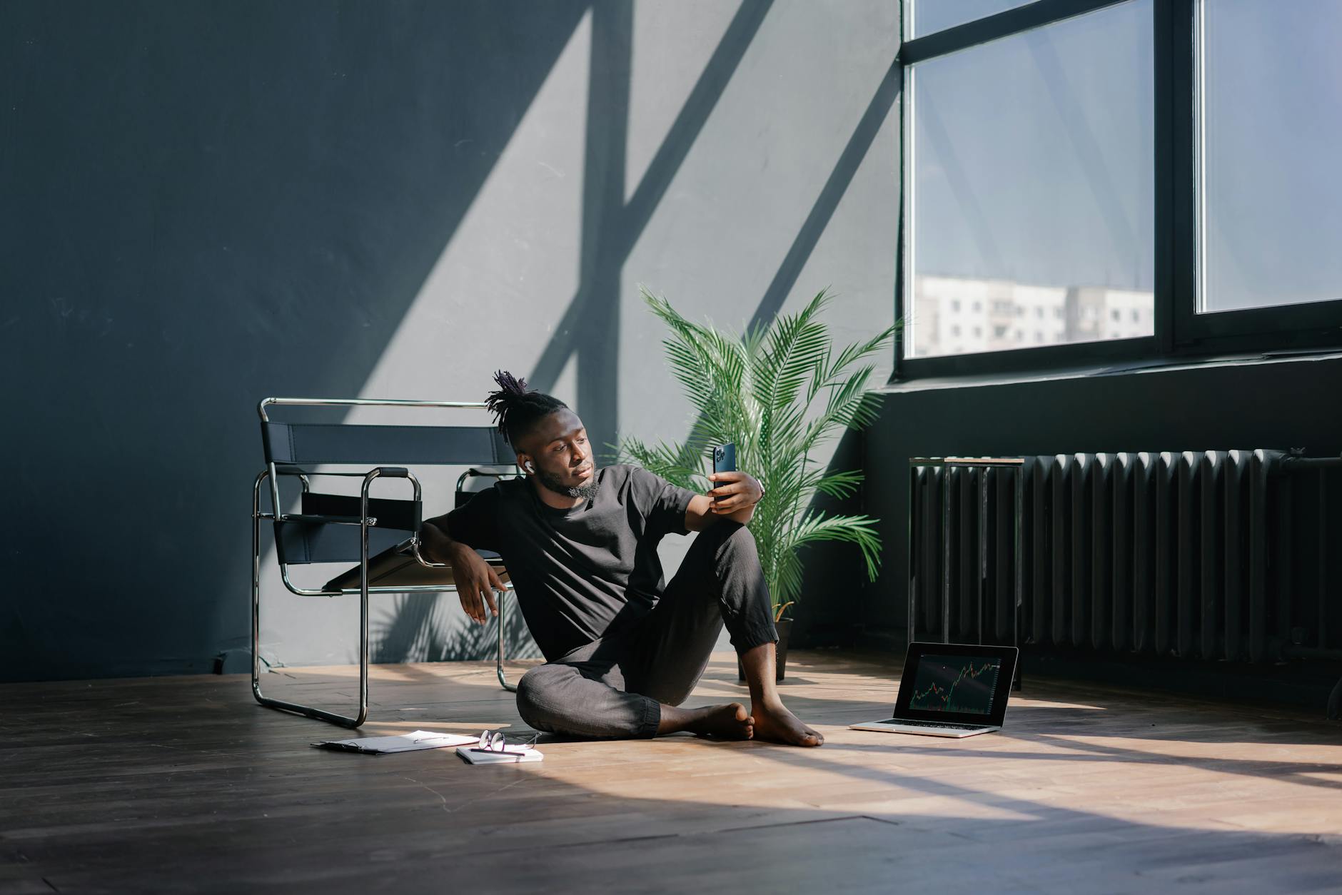 Woman in Black Shirt Sitting on Floor