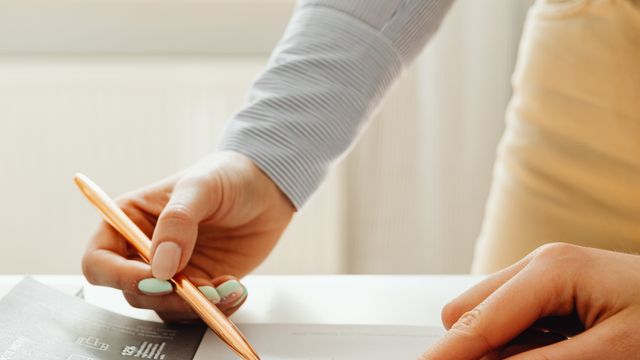 Psychologist reviewing digital marketing metrics on a laptop