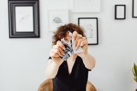 A Person Tearing a Piece of Paper into Pieces